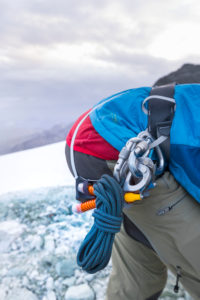 Mountaineer on the way to the Bishorn summit, climber with safety belt Mountaineer on the way to the Bishorn summit, climber with safety belt